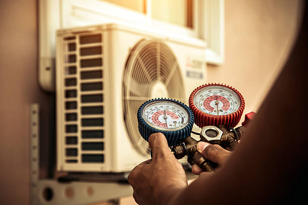 Professional Air Conditioning Service technician working in Madison, TN